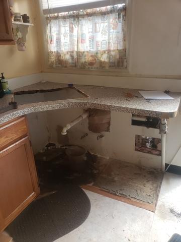 Sink Drain Line Leak in Landing